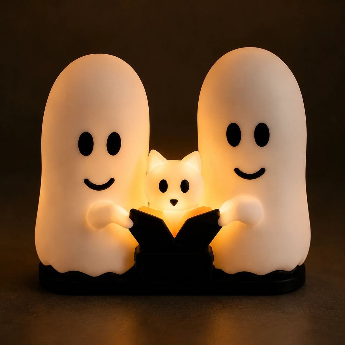 Ghosts and cat plug-in night light illuminated view